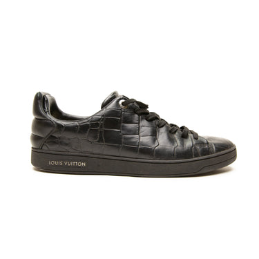 The right of the Louis Vuitton Frontrow Black Crocodile Embossed Leather Sneakers .