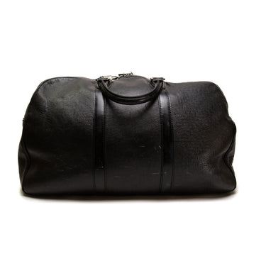 The back of the Louis Vuitton Black Duffel Bag.