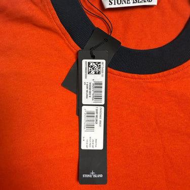 The label of the Stone Island Marina Back Logo Red Long Sleeve Oversized T Shirt.