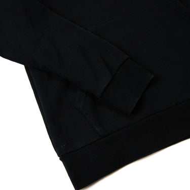 The sleeve detail of the Palm Angels Spray Logo Black Hoodie.