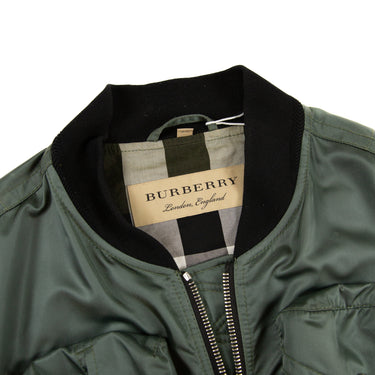 The collar and inside label of the Burberry Green Utility Bomber Jacket.