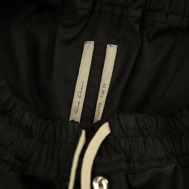 The inside label of the Rick Owens Bela Bermuda Shorts.