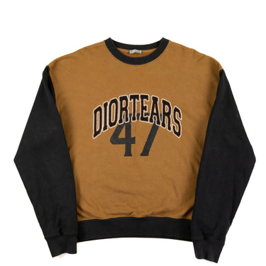 The front fview of the Dior x Denim Tears Brown Sweatshirt.