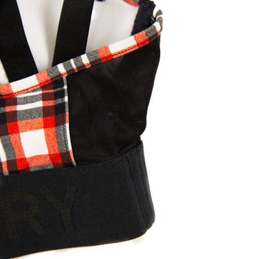 The clasp detail of the Burberry Red Check Bra Top.