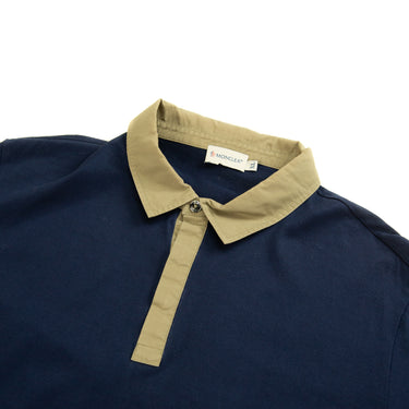 The collar of the Moncler Navy & Beige Polo Shirt.