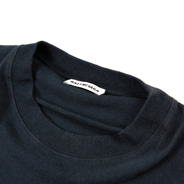 The label inside the collar of the Balenciaga Pink Logo T-shirt in black.