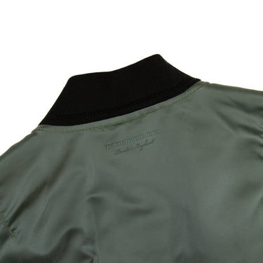 The back of collar of the Burberry Green Utility Bomber Jacket.