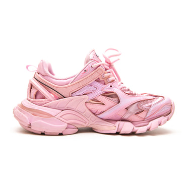The left of the Balenciaga Pink Track Trainers.