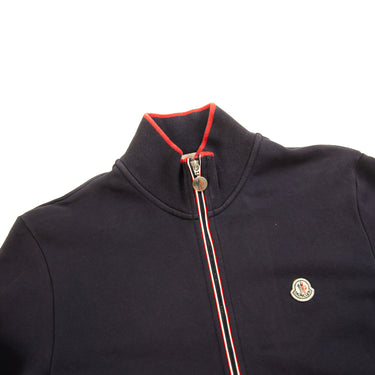 The collar and logo of the Moncler Cotton Zip-Up Navy Sweatshirt.