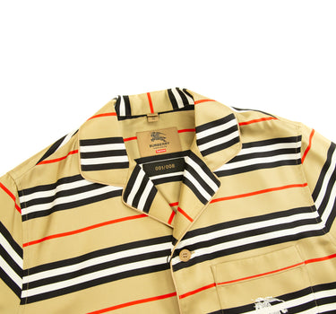 The collar of the Burberry x Supreme Icon Silk Pajama Shirt Archive Beige.