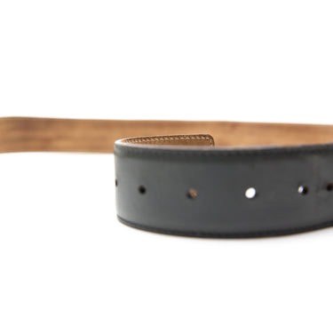 The holes of the Gucci Blue & Yellow Striped Canvas Silver GG Buckle Belt.