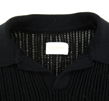 The collar of the Aime Leon Dore Mesh Knit Black Polo.