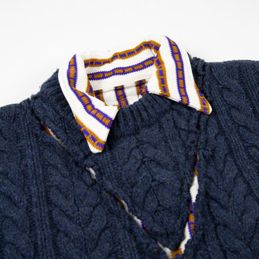 The front collar of the Maison Margiela FW16 Polo Cable Knit Sweater in navy.