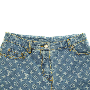 The waistband of the Louis Vuitton Monogram Denim Jeans.