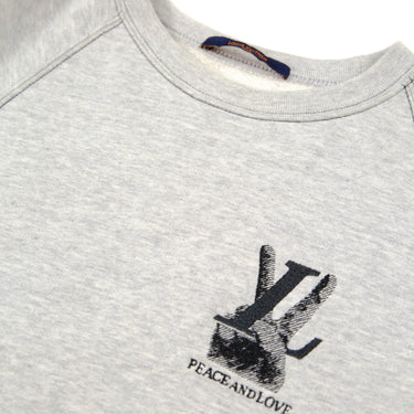 The logo on the grey Louis Vuitton Peace & Love Sweatshirt.