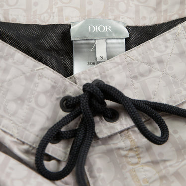 The waistband of the Dior Oblique Swim Shorts.