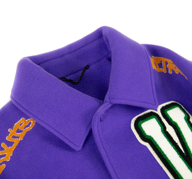 The collar of the Louis Vuitton Multi-Patches Mixed Leather Varsity Jacket.