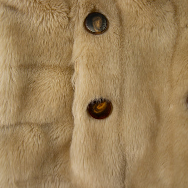 The buttons of the Gucci Cream Faux Fur Short Coat.