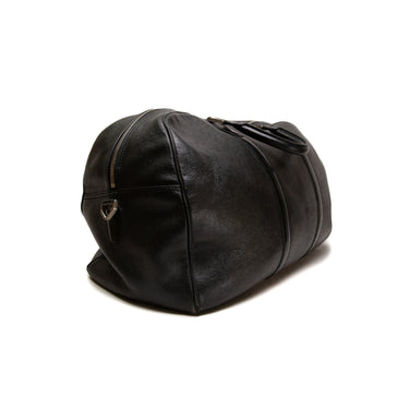 The side of the Louis Vuitton Black Duffel Bag.