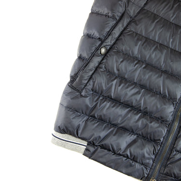 The zip of the Moncler Navy Magllia Gilet.