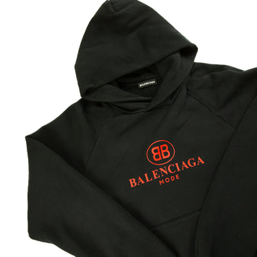 The hood and logo of the Balenciaga Mode Red & Black Hoodie.