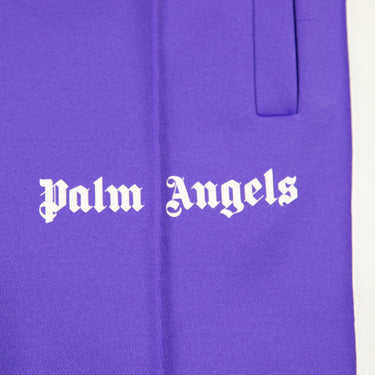 The logo of the Palm Angels Purple Sweatpants.