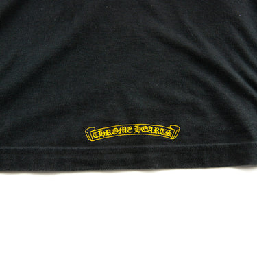 The logo of the Chrome Hearts Cross Black Yellow Long Sleeve T-Shirt.