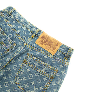 The logo of the Louis Vuitton Monogram Denim Jeans.