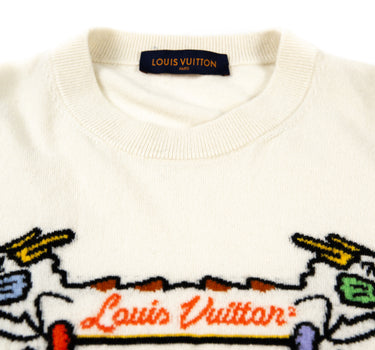 A close-up view of the Louis Vuitton x Nigo Dragon Intarsia Jacquard Sweater logo.