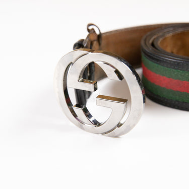 The front of the Gucci Classic Striped GG Belt in multicolour, featuring a logo.