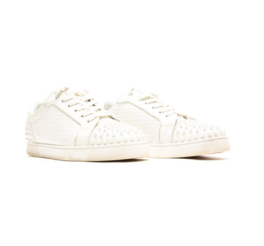The side of the Christian Louboutin Seavaste 2 Orlato White Flat Trainers.