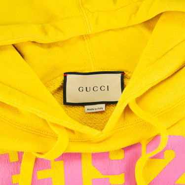 The label of the Gucci 1921 Print Yellow Hoodie.
