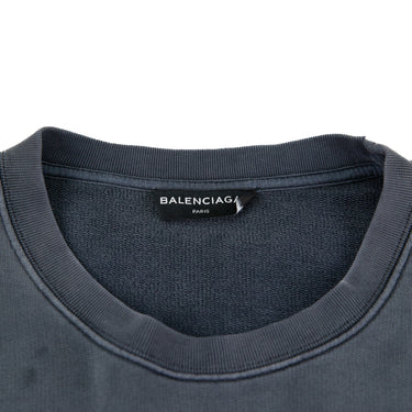 The inside label of the Balenciaga Sinners Sweatshirt.