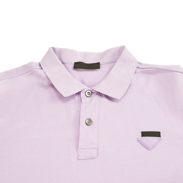 The collar and logo of the Prada Lilac Pique Polo Shirt.