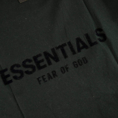 The logo of the Fear Of God ESSENTIALS Stretch Limo T Shirt M.