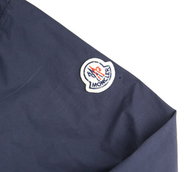 The logo of the Moncler Black Windbreaker.
