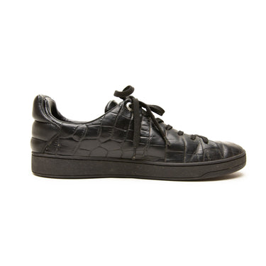 The left of the Louis Vuitton Frontrow Black Crocodile Embossed Leather Sneakers .
