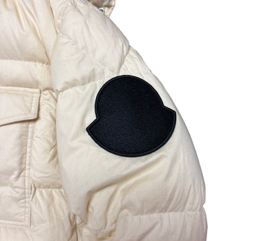 The logo of the Moncler Twist Huarez Cream Puffer Jacket.