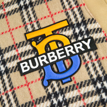 The logo of the Burberry Check Motif Applique Sweater.