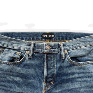 The waistband of the Tom Ford Straight Leg Jeans.