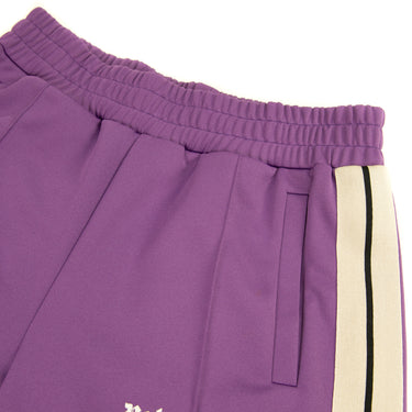 The logo of the Palm Angels Dark Purple Sweatpants L.