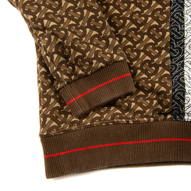 The sleeve of the Burberry TB Monogram Brown Sweatshirt.
