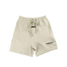The front of the Fear Of God ESSENTIALS Dark Oatmeal Shorts M.