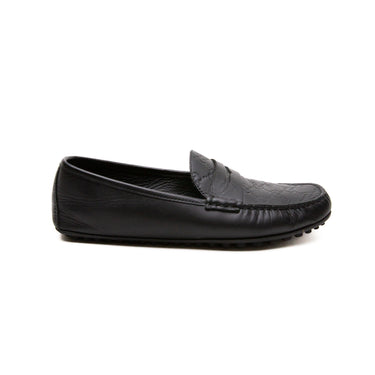 The right side of Gucci Black Loafers, showing smart styling.