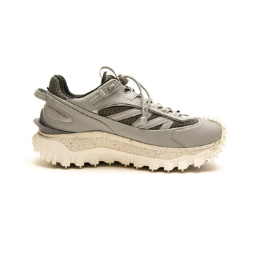 The left of the Moncler Trailgrip Low Top Sneakers.