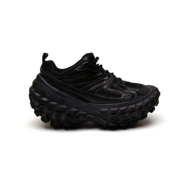 The right of the Balenciaga All Black Bouncer Sneaker.
