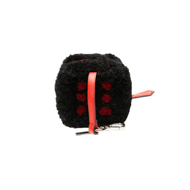 The left view of a Fendi Dice Box Bag in Black & Red.