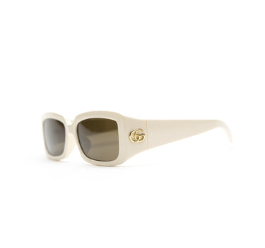 The side of the Gucci GG1403SK White Sunglasses.