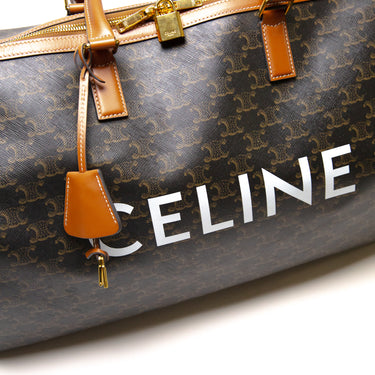 The logo of the Celine Voyage bag in Triomphe Canvas with Celine print.