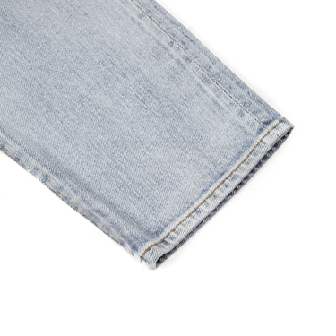 A close up of Dior X Kenny Scharf Denim Jeans in blue.